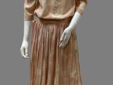 an image of a mannequin dressed in a peach dress