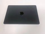 an apple macbook pro laptop sitting on top of a white table