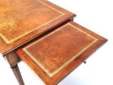 two wooden tables with matching tops and a matching table top