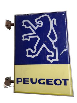 un panneau bleu et jaune sur lequel figure un lion