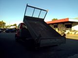 an image of a truck with a ramp in the back of it