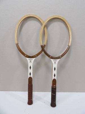 two tennis racquets that are on a table