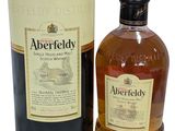 an image of a bottle of aberfieldy whisky next to a canister