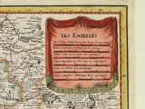 an old map of the region of les exerbites, with a red curtain