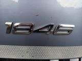 a close up of the emblem on a car ' s hood
