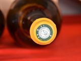 two bottles of wine that are sitting on a table