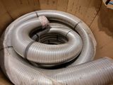 a cardboard box that has a bunch of pipes inside of it