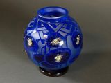 a blue vase with a blue flower design on it