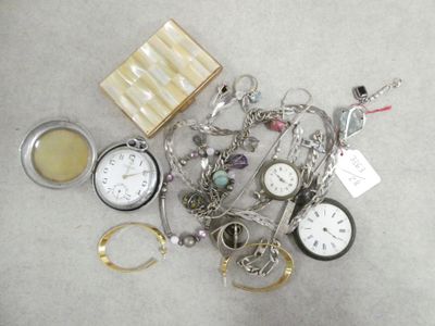 a pile of assorted jewelry on the floor