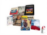 a lot of books that are sitting on a table