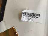 a piece of metal that has a barcode on it