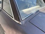 a car that is parked on the side of the street