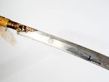 a knife that has been left on the table with a tag on it
