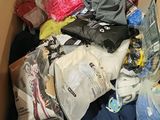 a box full of clothes and other items in it