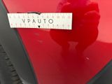 a sticker on the hood of a red car that says vpauto