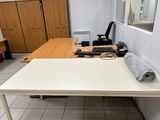 a white table with a roll of paper on top of it
