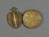 an image of a gold medal with a cross on top of it