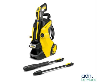 a yellow pressurer and a black tool on a white background