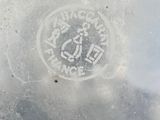 a drawing on the ice of a man on a bicycle