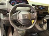 dashboard view of a car with a steering wheel and dashboard controls