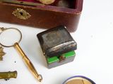 a wooden box with a bunch of different items on it