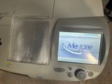 a machine that is sitting on the floor with a message on it