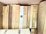 a box full of books that are sitting on a table