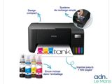 a close up of a printer with ink and ink bottles on it