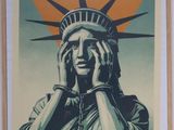 une photo d'une affiche sur laquelle figure la statue de la Liberté