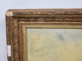 an old picture of a painting with a gold frame on a white wall