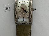 a watch that is on display on the wall