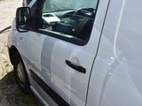 a white van that is parked in a lot