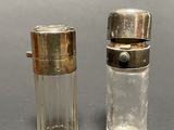 two lighters sitting next to each other on a table
