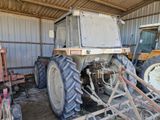 a tractor that is parked inside of a building