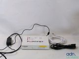 a white box with wires and a charger on it