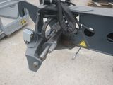 a close up of a machine that is sitting on the ground