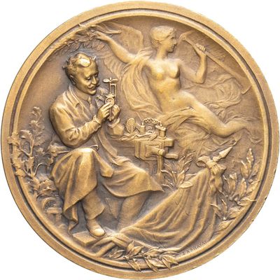 l'image d'une médaille d'or sur laquelle figurent un homme et une femme
