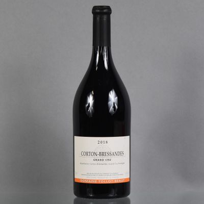 a bottle of wine that is sitting on a table