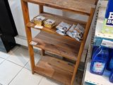 a shelf that has various items on it in a store