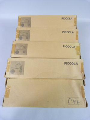 four pieces of cardboard are stacked on top of each other on a white surface