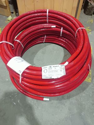 a red hose that is sitting on the floor