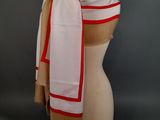 a mannequin with a scarf on top of it