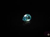 a blue diamond on a black background