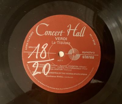 an old record with a label on it that says concert hall