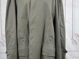 an image of a coat on a mannequin stand