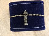 an image of a bracelet with a cross on it
