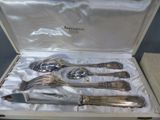 a box with a set of silverware in it