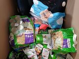 a box full of food that is sitting in the back of a car