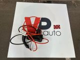 a sign that has a red cord attached to it