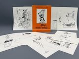beaucoup de cartes illustrées posées sur une table
